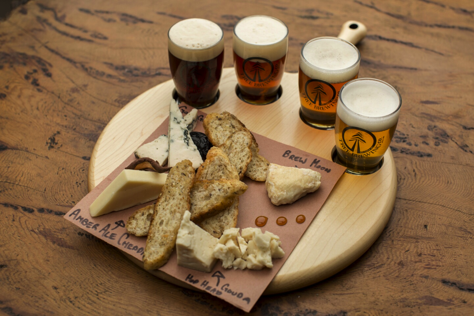 The tasting room at Tree Brewing Company is just the way to live like a local when using our Kelowna hotel vacation guide. Image credit: <a href="https://www.tourismkelowna.com/">Tourism Kelowna</a>
